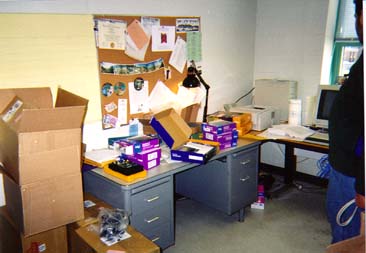 Boxes litter Prof. Jeremic's office.